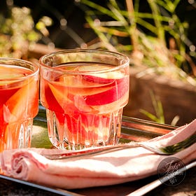 Chilled peaches in wine
