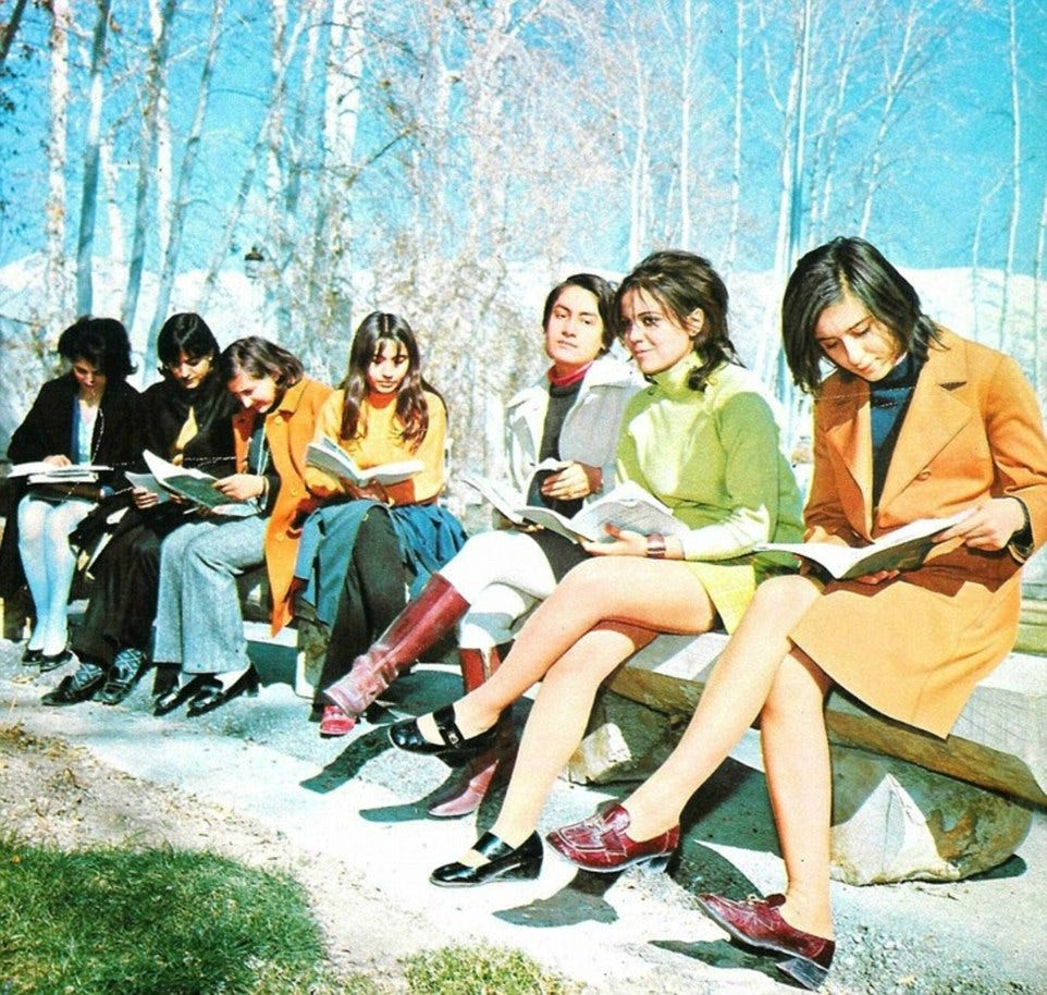 Promise of a vibrant future: Female students at Tehran university in 1971 read their books in the sunshine while wearing bold miniskirts and contemporary fashions