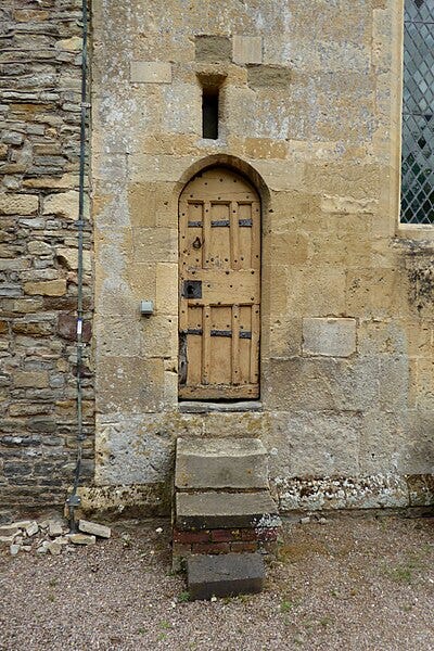File:Small door on the west of St Mary's Priory Church, Deerhurst.jpg