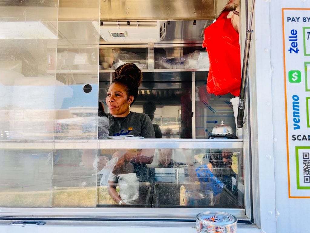 Oluwalogbon's wife Bisola, who runs the Philly outpost of the food truck Oluwalogbon's wife Bisola, who runs the Philly outpost of the food truck