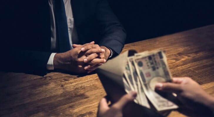 Should You Pay Off Debt or Invest? - SmartAsset