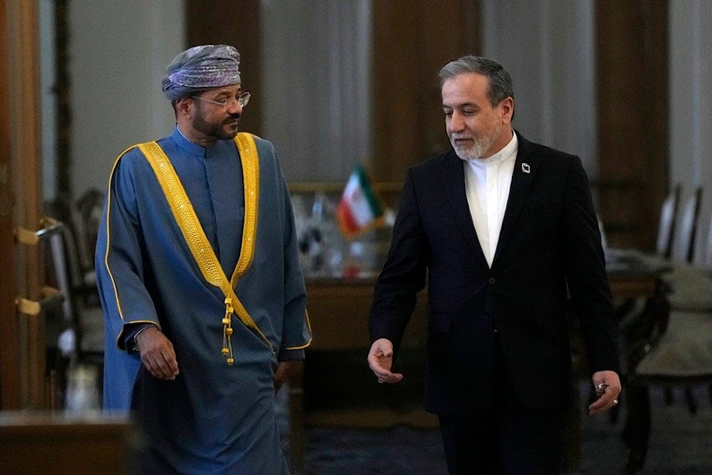 Iranian Foreign Minister Abbas Araghchi, right, speaks with his Omani counterpart Sayyid Badr Albusaidi as they arrive for a press briefing after their meeting in Tehran, Iran, Monday, Dec. 30, 2024 (AP) Iranian Foreign Minister Abbas Araghchi, right, speaks with his Omani counterpart Sayyid Badr Albusaidi as they arrive for a press briefing after their meeting in Tehran, Iran, Monday, Dec. 30, 2024 (AP)