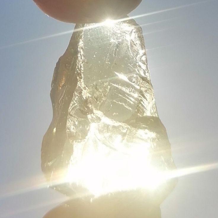This may contain: the sun is shining behind a large piece of foil