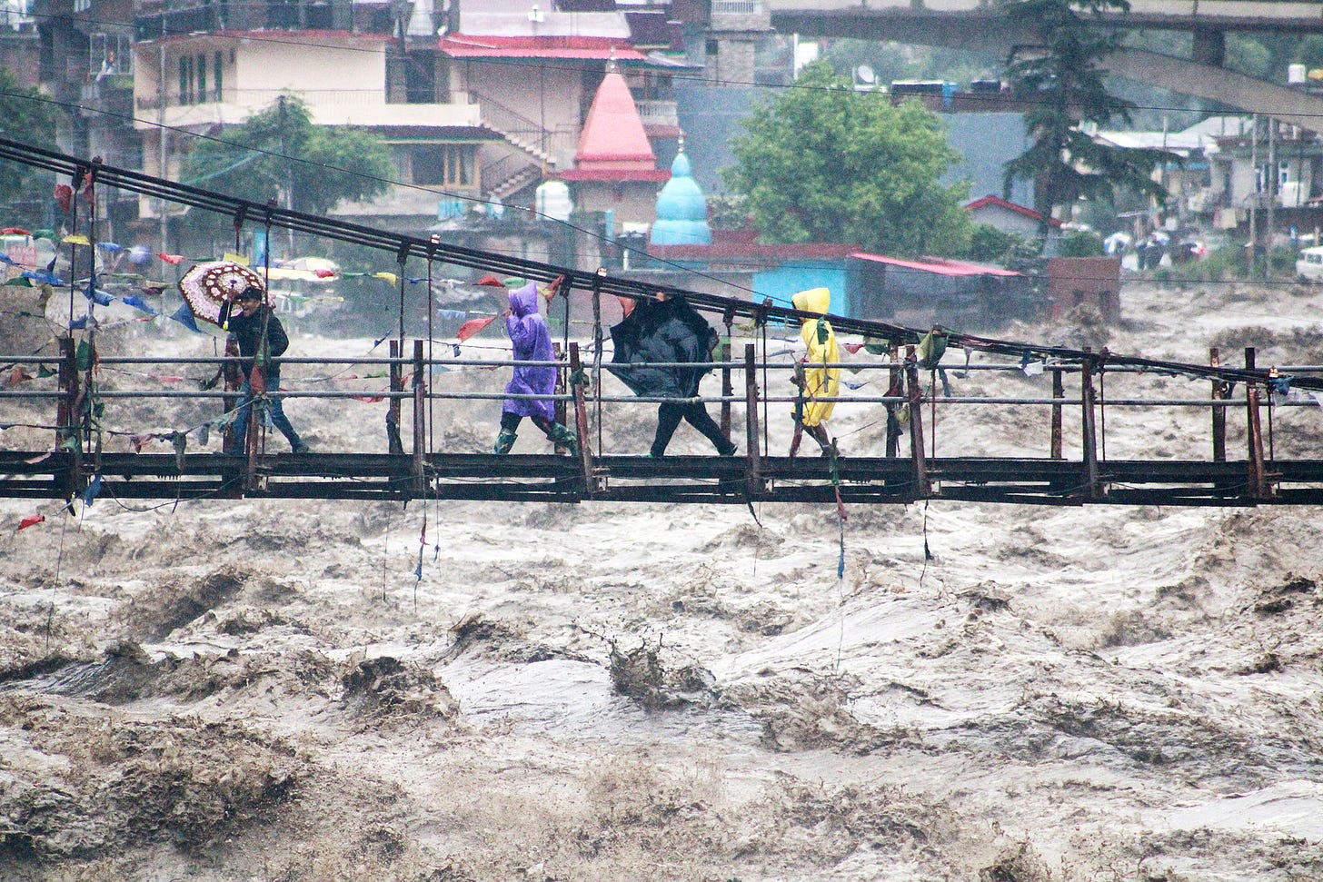Floods kill at least 15 in India; Pakistan on alert as waters are diverted