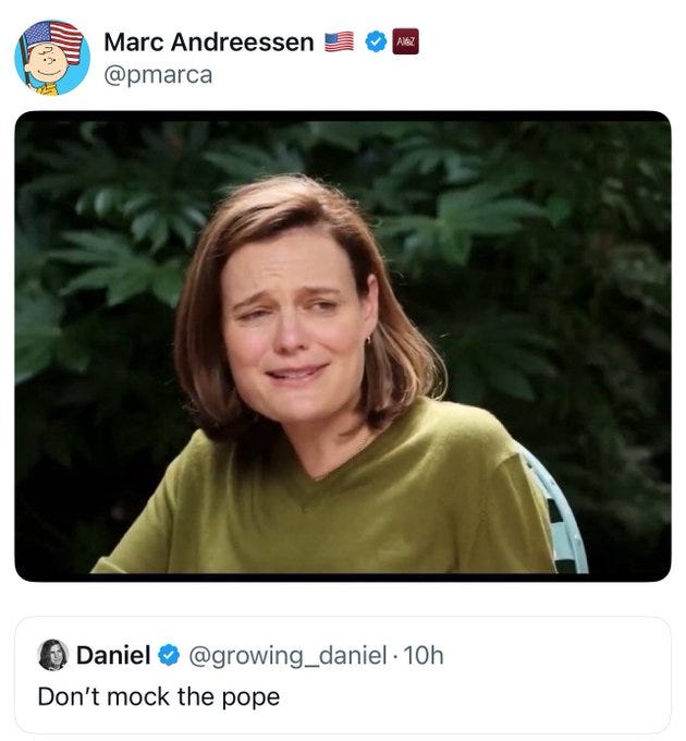 A composite image overlays a cartoonish avatar of a bald man with glasses resembling Marc Andreessen wearing a suit and American flag pins along with other flag and logo icons on the face of a woman with shoulder-length brown hair parted in the middle wearing a green v-neck top sitting on a cushioned outdoor chair surrounded by green foliage looking directly at the camera with a concerned and teary-eyed expression as if crying.