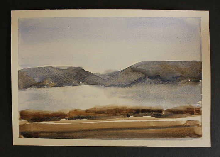 Watercolor landscape of distant blue-gray mountains above a misty river with earthy brown shoreline in the foreground. | Watercolor painting of a calm river with dark hills in the background and earthy brown grasses in the foreground.