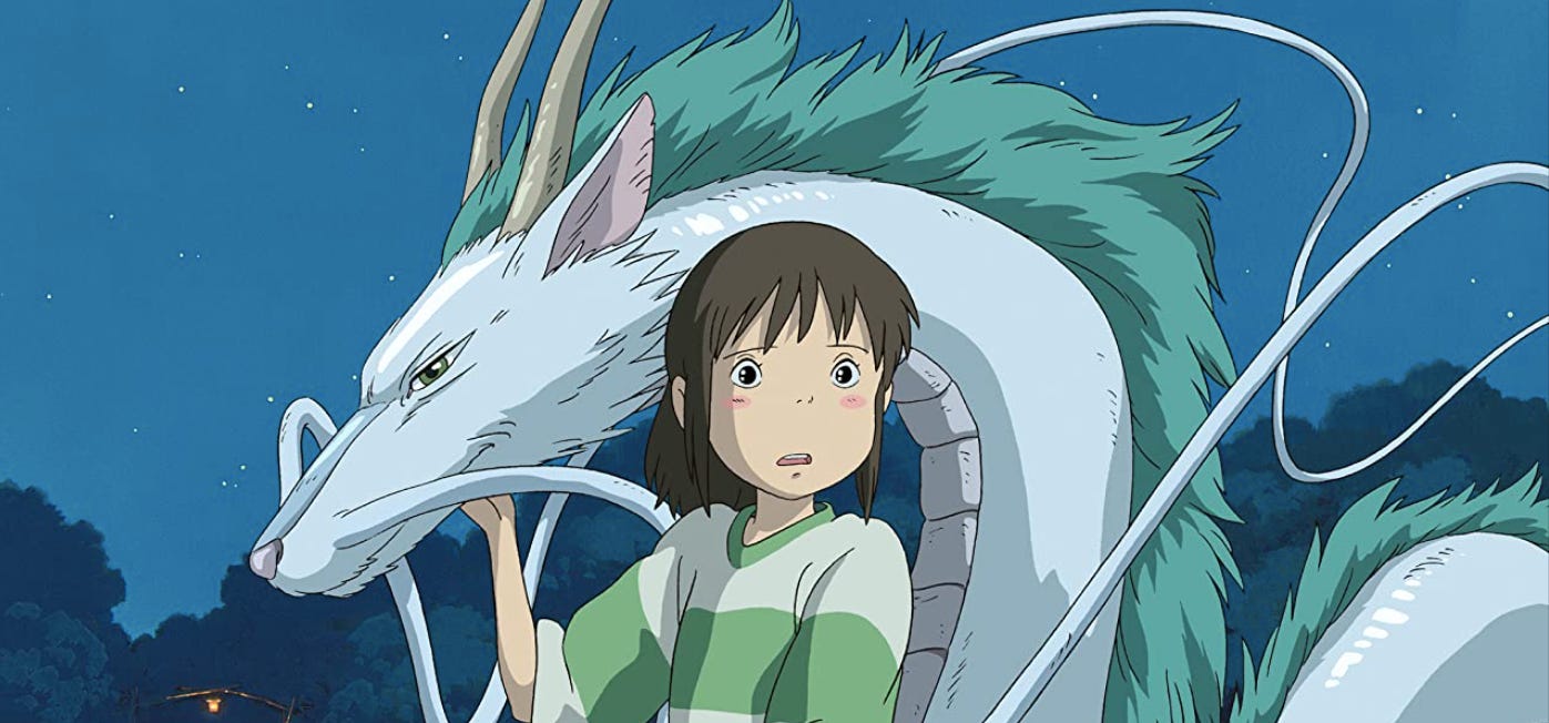 animated still from spirited away; girl looks surprised as she skritches a fox/dragon thing behind her.