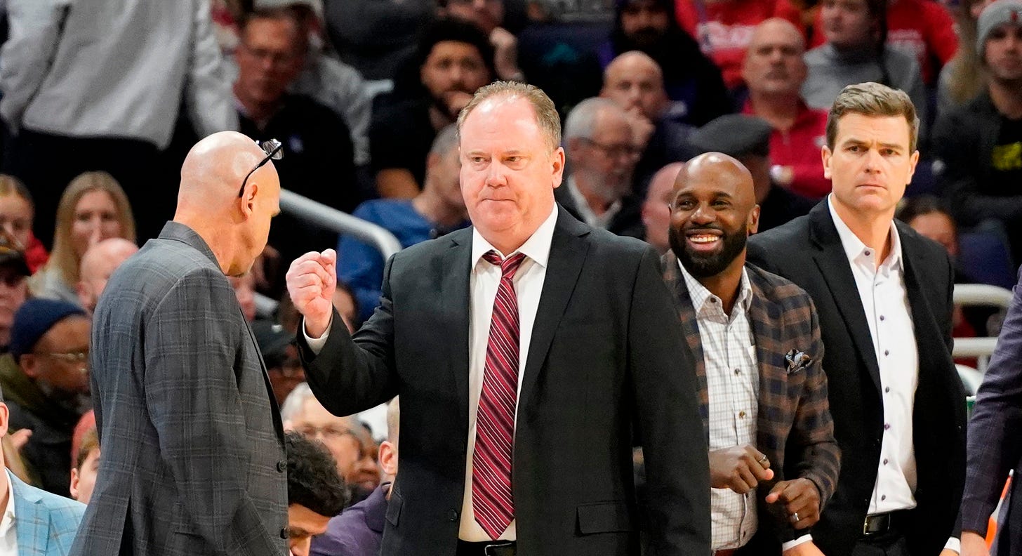Wisconsin Badgers head coach Greg Gard gestures to his basketball team