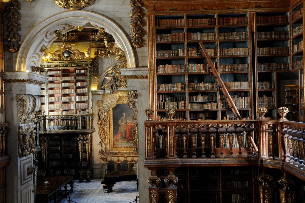 university libraries Book Indoors Library Publication Person Furniture Keyboard Musical Instrument Piano and Desk