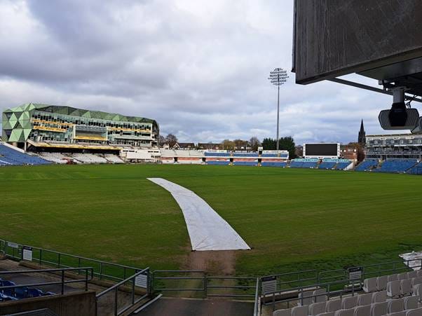 A football field with a white line

AI-generated content may be incorrect.