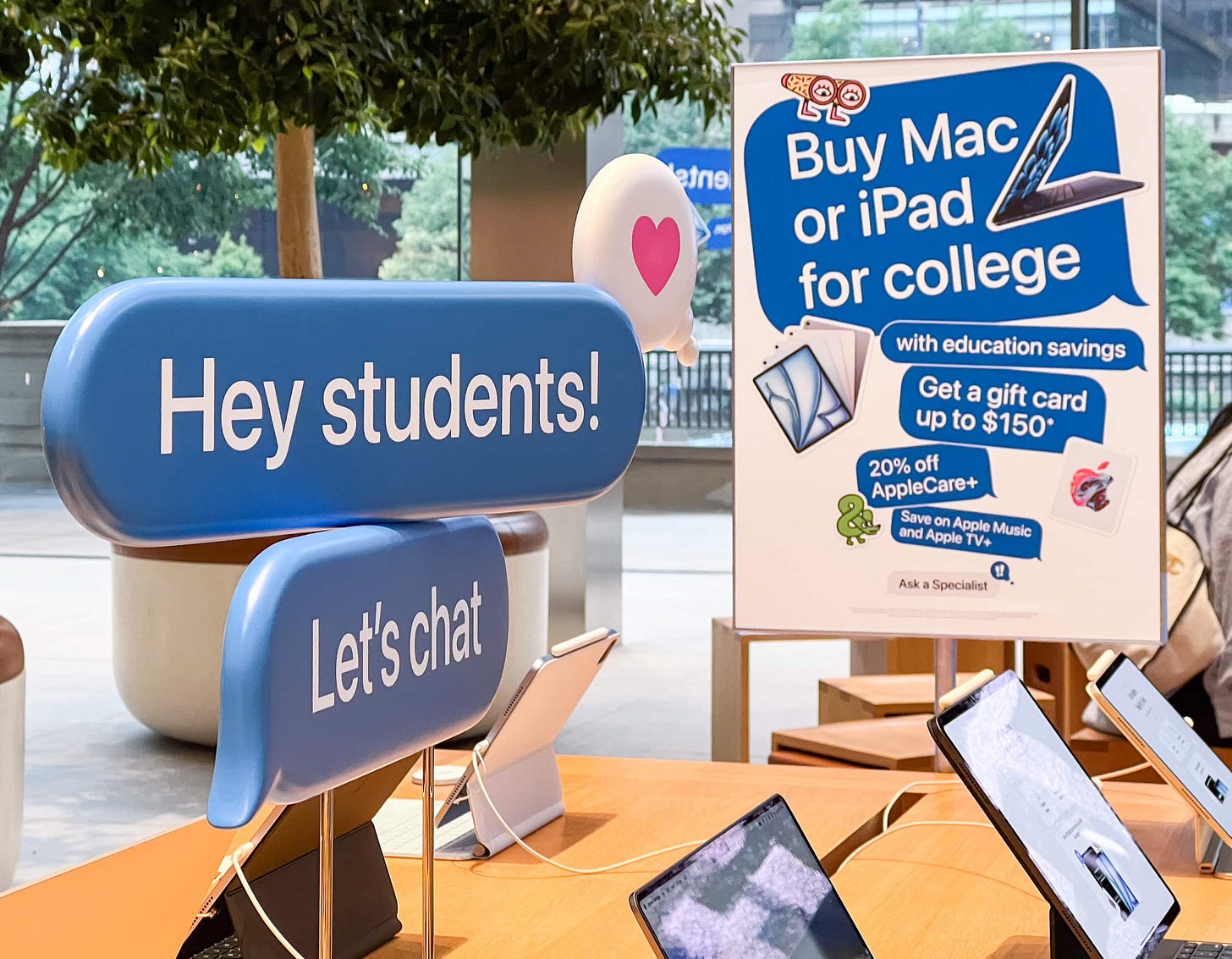 A Back to School easel and table display at Apple Michigan Avenue. A Back to School easel and table display at Apple Michigan Avenue.