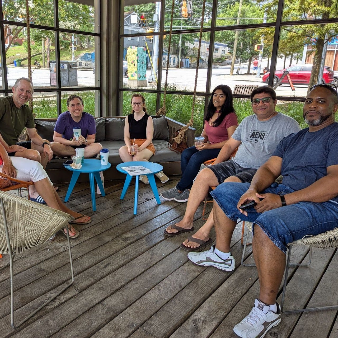 Folks outdoors at a coffee shop 