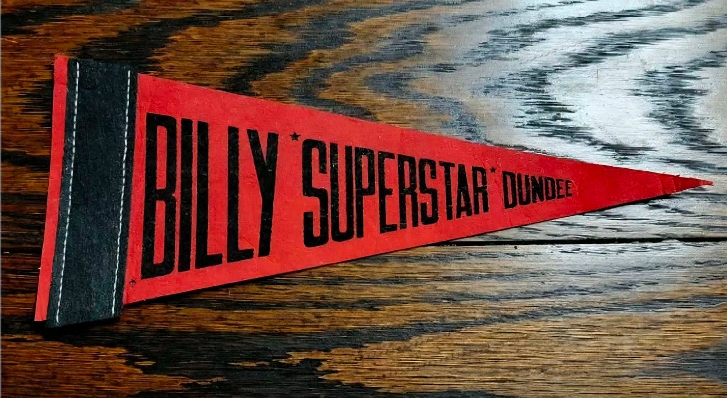 May be an image of text that says 'BILLY SUPERSTAR DUNDEE' May be an image of text that says 'BILLY SUPERSTAR DUNDEE'