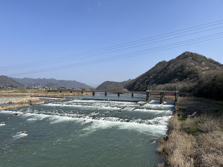 Pictures of a Japanese river weir and mountains
