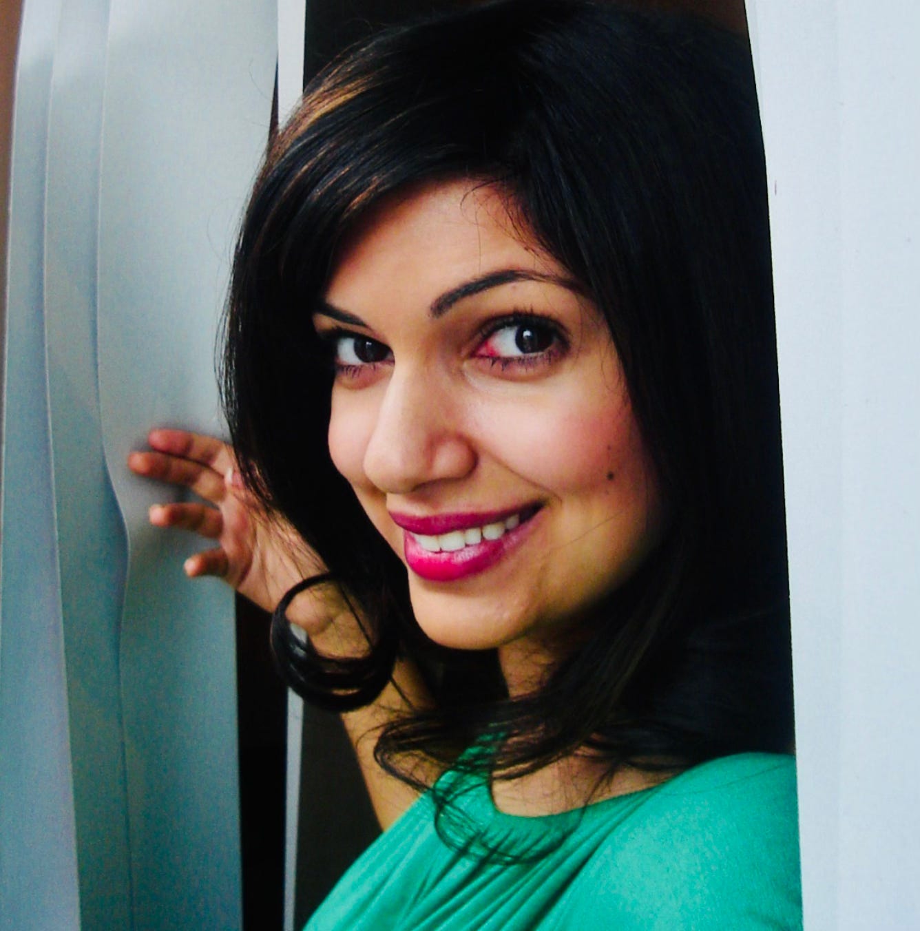 an Asian girl smiling