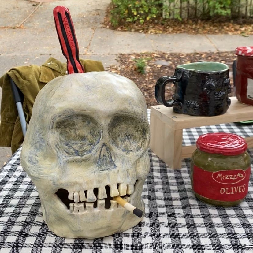 ceramic sculpture of skull with screwdriver by artist paloma jimenez ceramic sculpture of skull with screwdriver by artist paloma jimenez