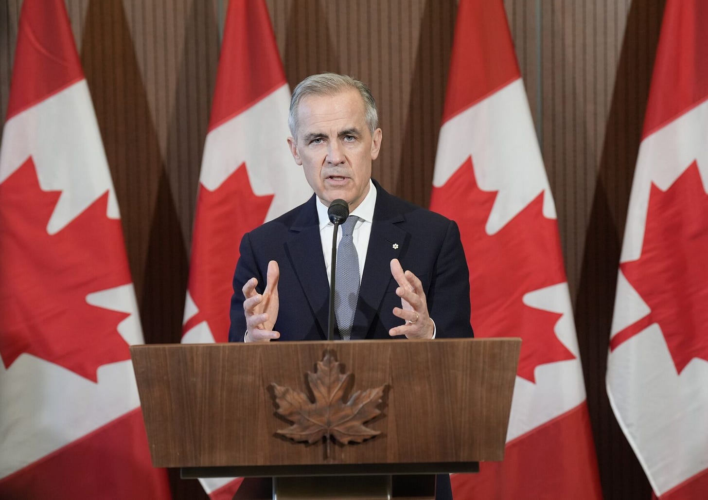 Carney hands presser.JPG Carney hands presser.JPG