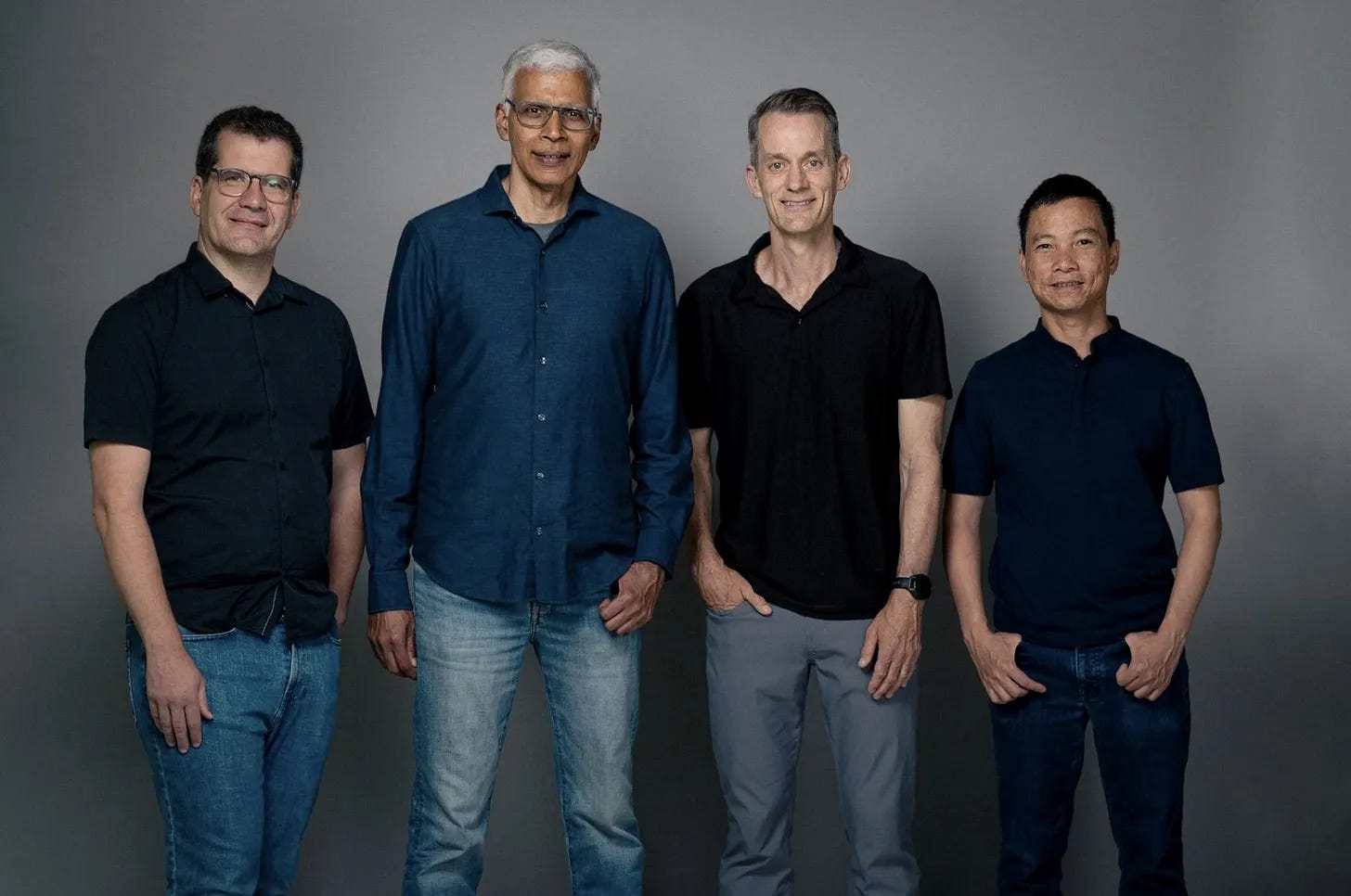 The four Discovery Loop co-founders standing together: Oriol Vinyals, Sanjay Ghemawat, Jeff Dean, and Quoc Le.