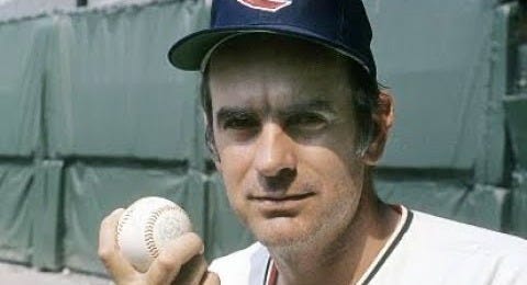 Perry showing his forkball grip.