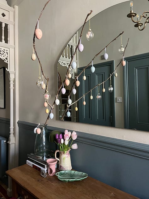 Doorstep daffodils; tulips and candles; a spring branch