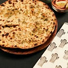 Between Parathas and Butter: A Story of Taste and Belonging.