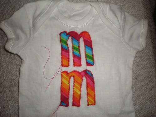 Onesie with M Onesie with M