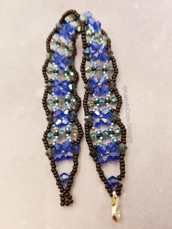 sparkly beaded bracelet made of blue and black glass beads