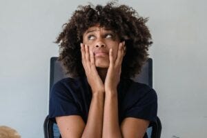 a doubtful looking woman