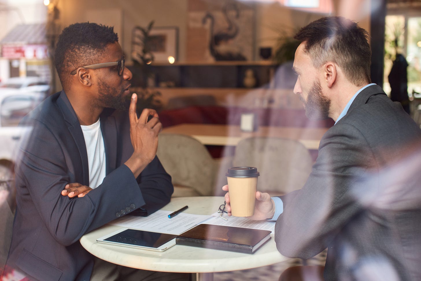 Professional meeting in coffee shop