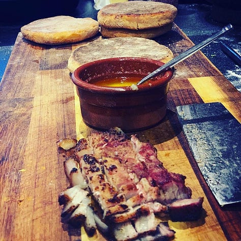 Grilled meats, flat breads and fries
