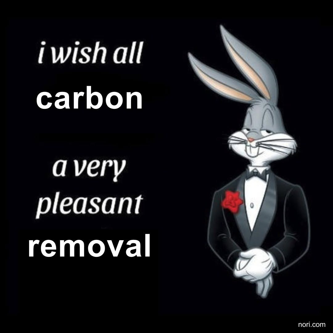 Bugs Bunny in a tuxedo with a red rose, beside the words "I wish all carbon a very pleasant removal".