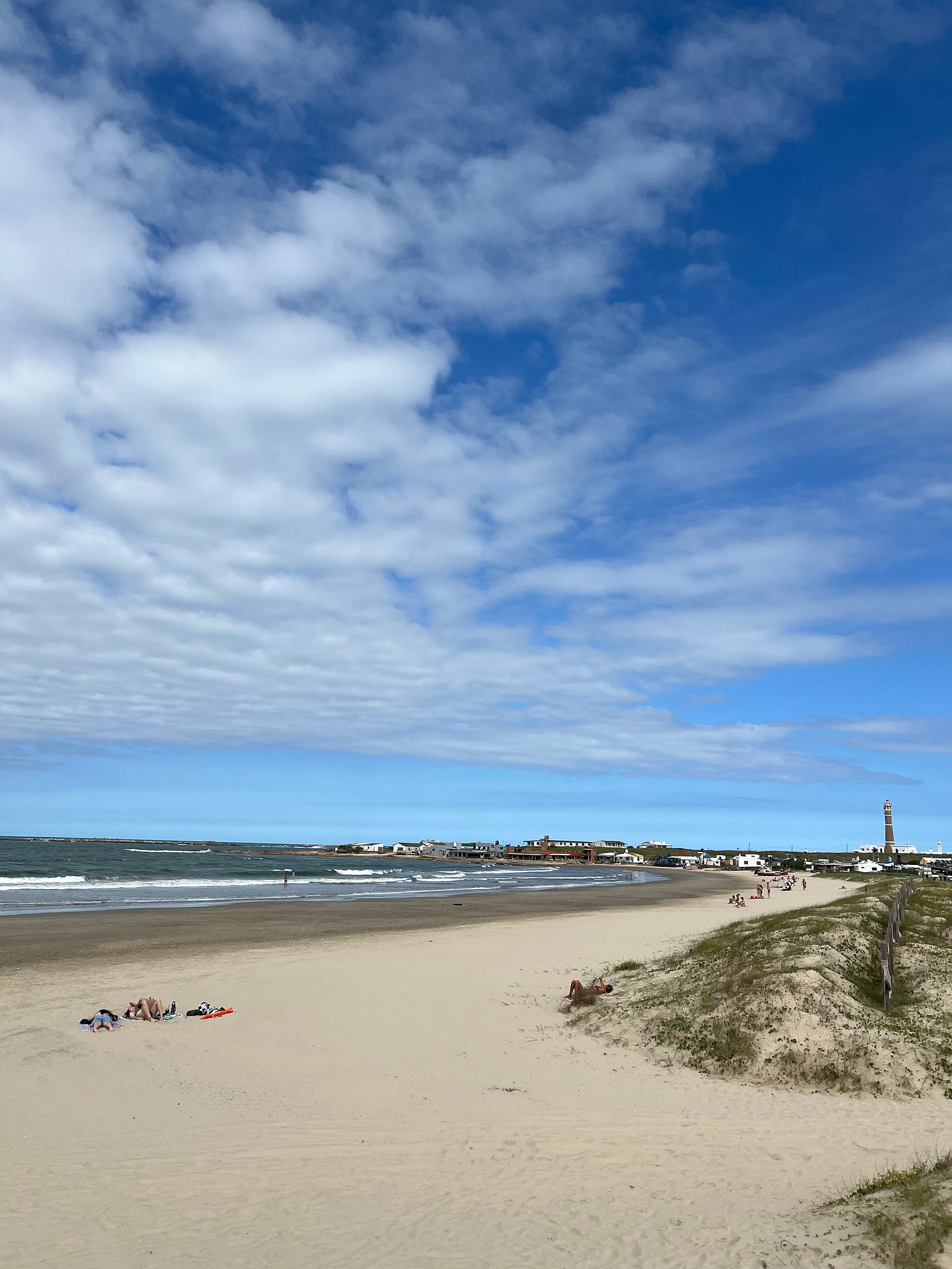 an empty beach on a sunny day with blue sky in cabo polonio