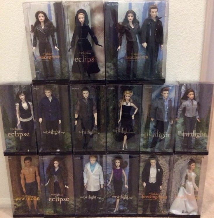 This may contain: the twilight saga movie action figures are on display