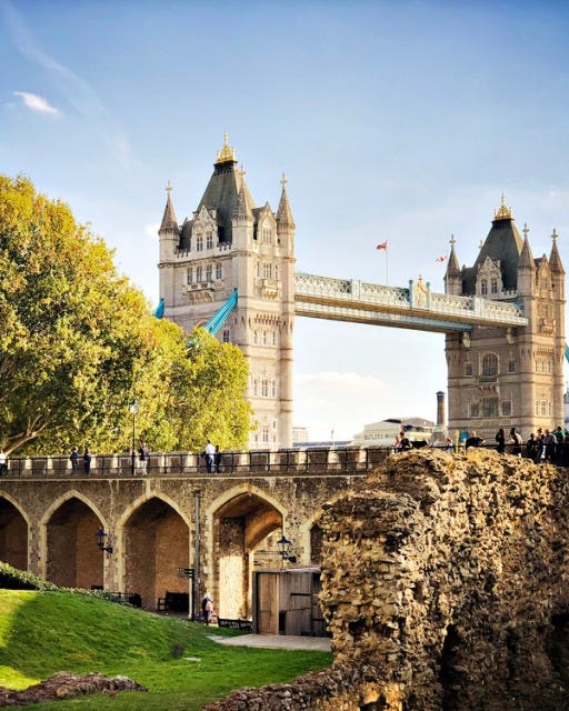 May be an image of 6 people, the Tower of London and Tower Bridge
