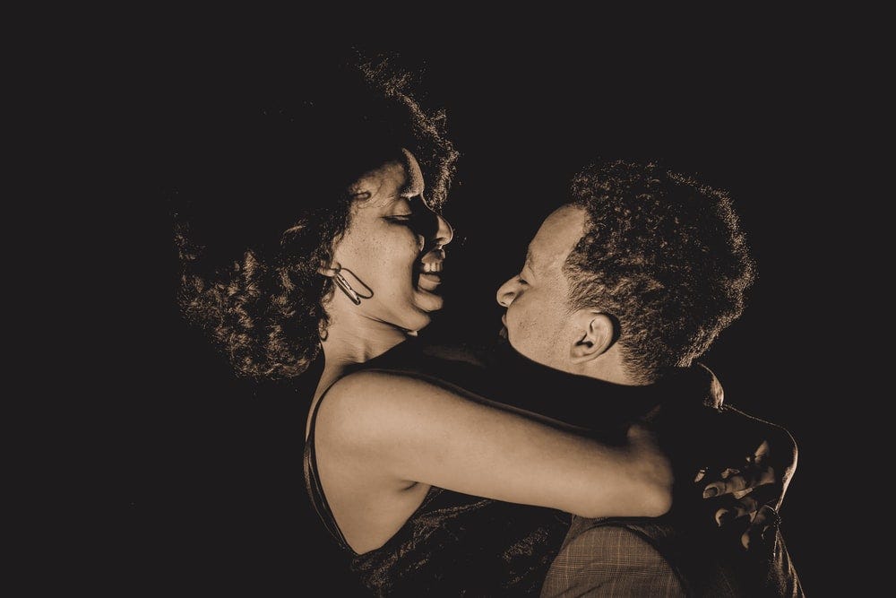 woman and woman hugging each other woman and woman hugging each other