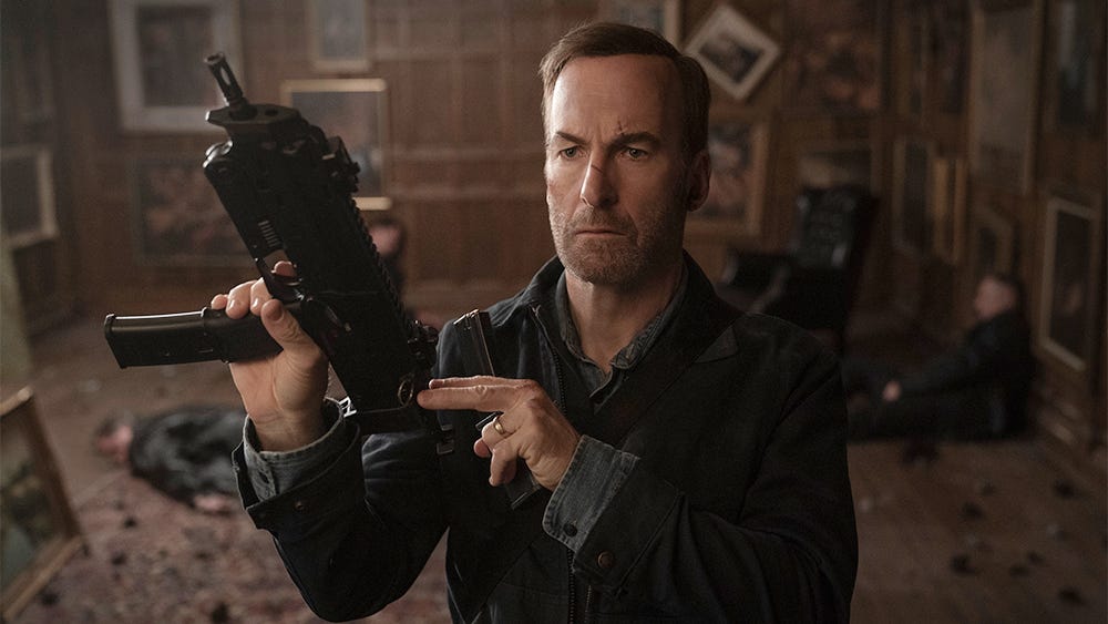 Hutch loading his gun amidst bodies of his enemies. Hutch loading his gun amidst bodies of his enemies.