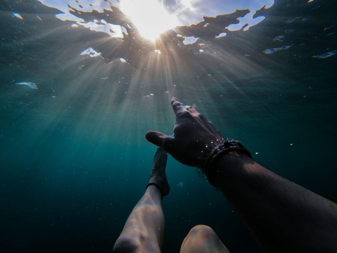 When a surfer gets tumbled by a wave… the way out is to let the water pull you back to the surface. When a surfer gets tumbled by a wave… the way out is to let the water pull you back to the surface.
