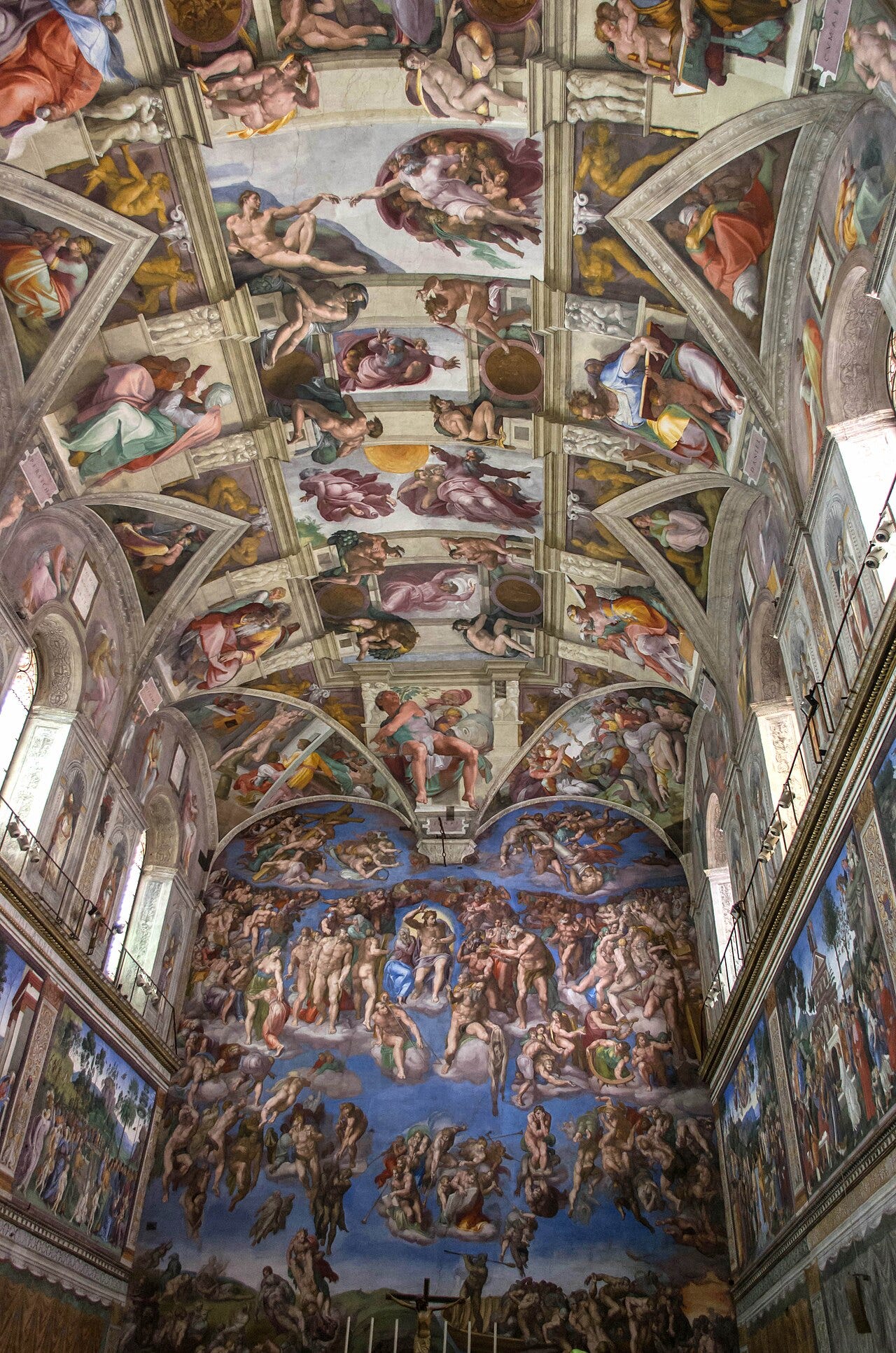 Michelangelo's painted ceiling of the Sistine Chapel with scenes from Genesis Michelangelo's painted ceiling of the Sistine Chapel with scenes from Genesis
