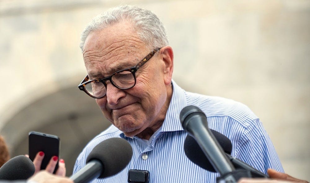 Sen Chuck Schumer, D-NY, talks with reporters outside of the Capitol during votes in Washington, Thursday, July 16, 2026. (AP Photo/Allison Robbert) Sen Chuck Schumer, D-NY, talks with reporters outside of the Capitol during votes in Washington, Thursday, July 16, 2026. (AP Photo/Allison Robbert)