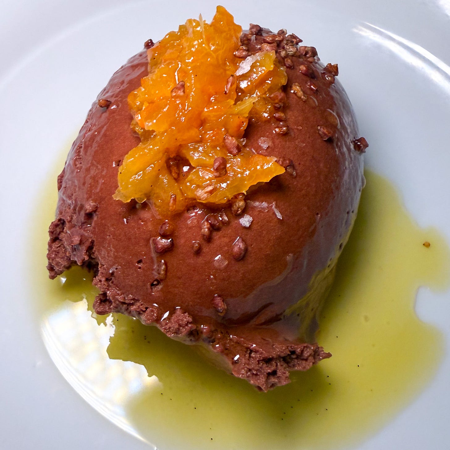Chocolate mousse with bitter-orange marmalade, cacao nibs and olive oil at Petit Vatel, Paris 6th Chocolate mousse with bitter-orange marmalade, cacao nibs and olive oil at Petit Vatel, Paris 6th