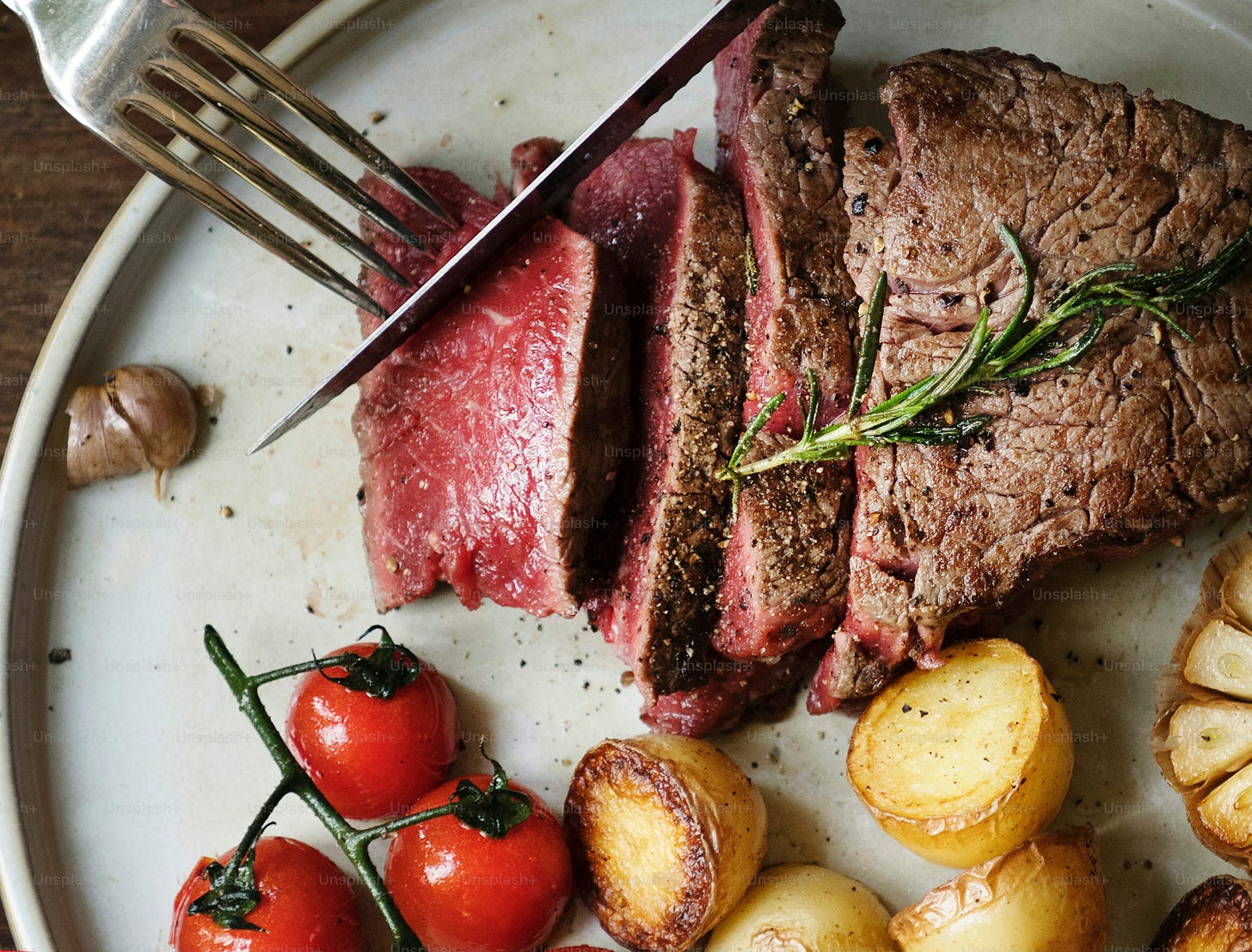 Close up of a cutting a fillet steak food photography recipe idea
