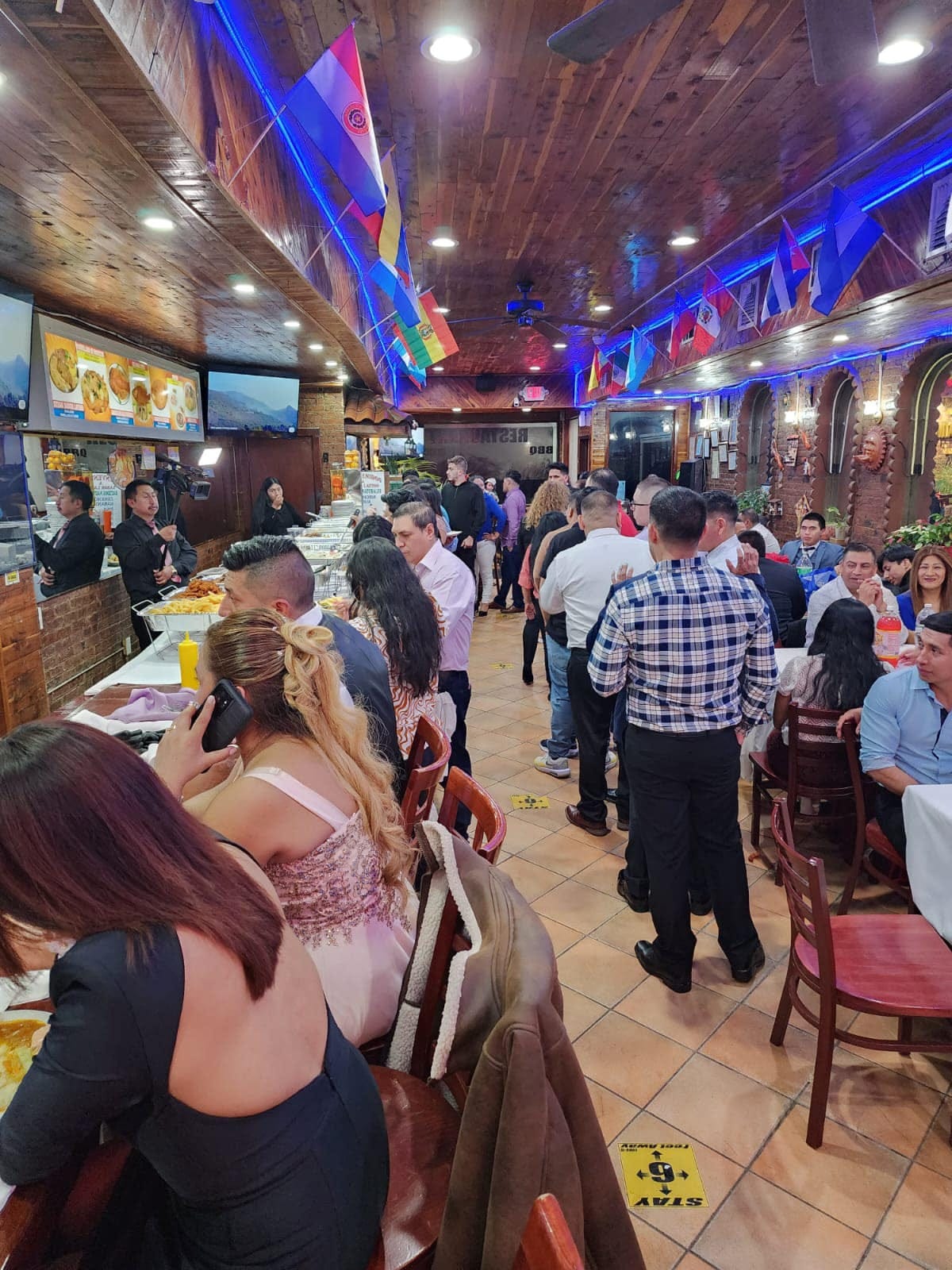 May be an image of 10 people, people standing and indoor