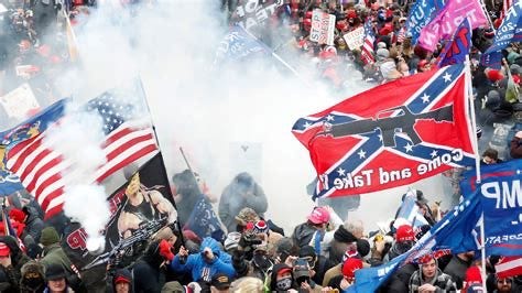 A crowd of people marching with flags and flags
AI-generated content may be incorrect. A crowd of people marching with flags and flags
AI-generated content may be incorrect.