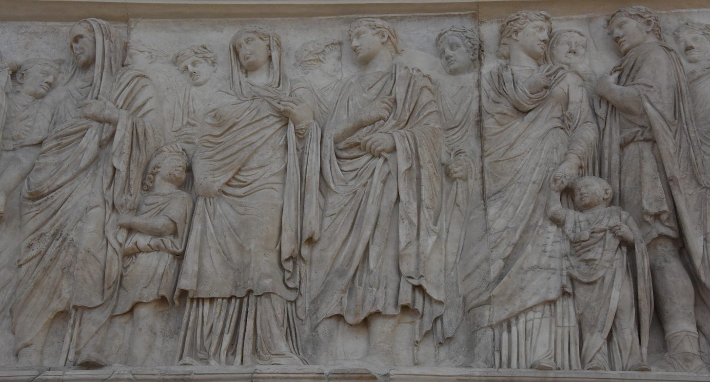 Sculpture showing a procession of upper-class ROmans going to the dedication of the altar of AUgustan peace - on which this is carved Sculpture showing a procession of upper-class ROmans going to the dedication of the altar of AUgustan peace - on which this is carved