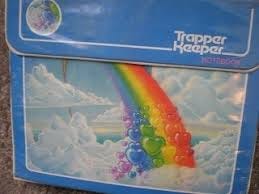 colorful 80s era trapper keeper brand binders, notebooks and folders