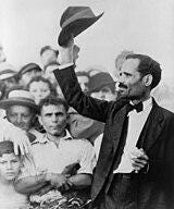 A person raising his hat up
Description automatically generated A person raising his hat up
Description automatically generated