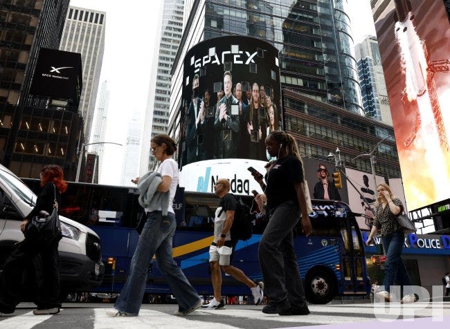 The Nasdaq MarketSite in Times Square displays Elon Musk and SpaceX branding during the SpaceX IPO The Nasdaq MarketSite in Times Square displays Elon Musk and SpaceX branding during the SpaceX IPO