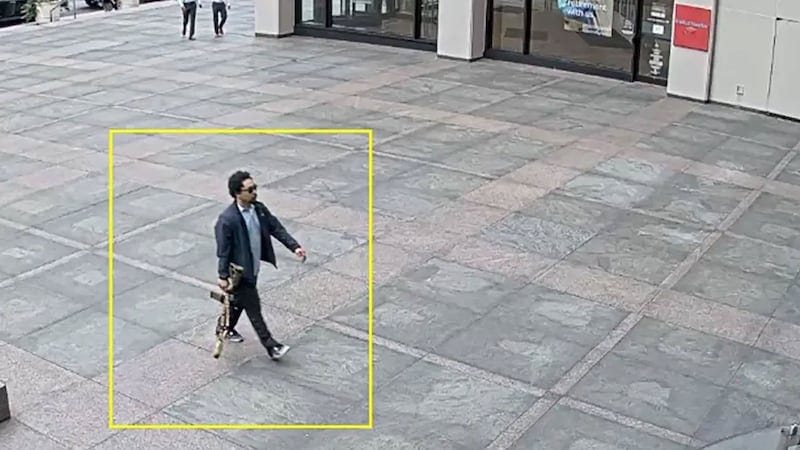 Chilling CCTV Pic Shows Cop Killer Walking Into NFL Building