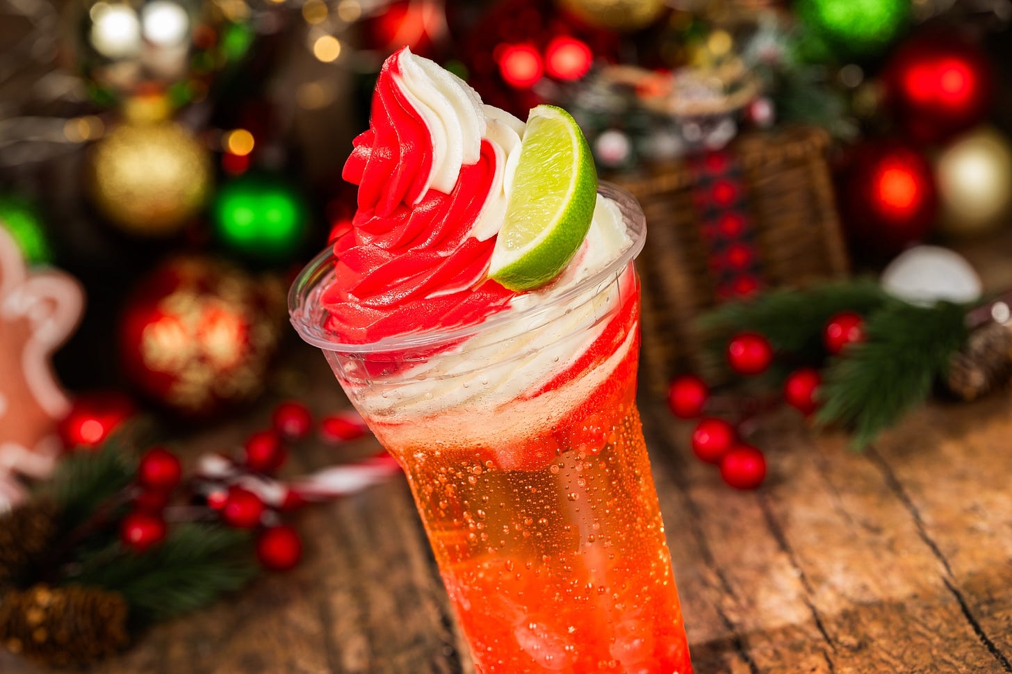 Pomegranate Yule Float: Ginger ale with DOLE Whip Pomegranate and vanilla soft-serve, pomegranate boba pearls, and a slice of lime