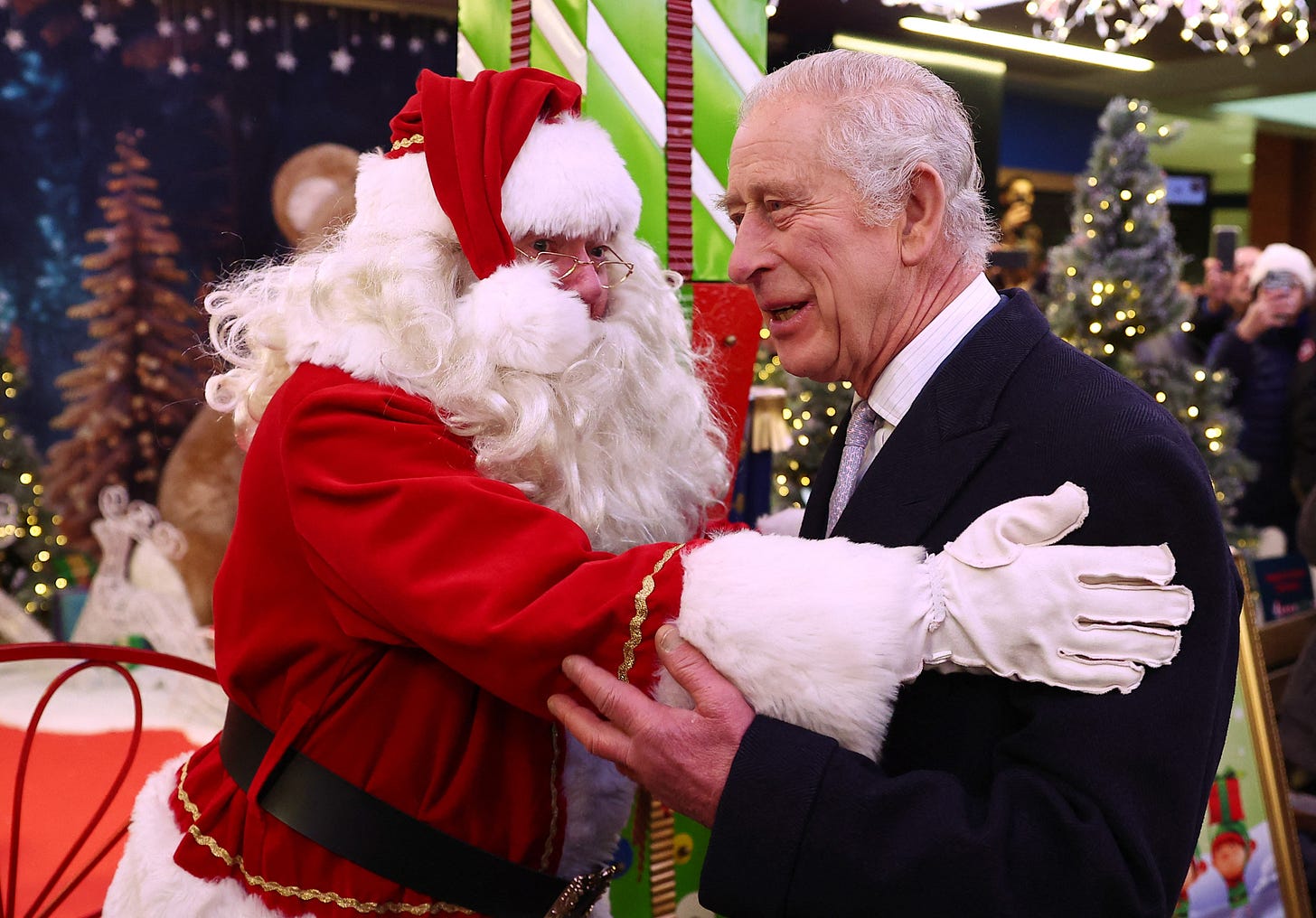 King Charles reacts to Santa Claus.